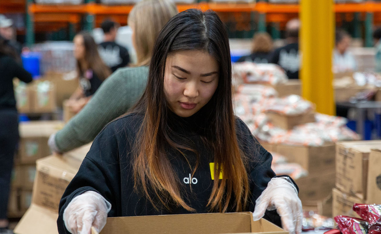 Team donating time to food bank